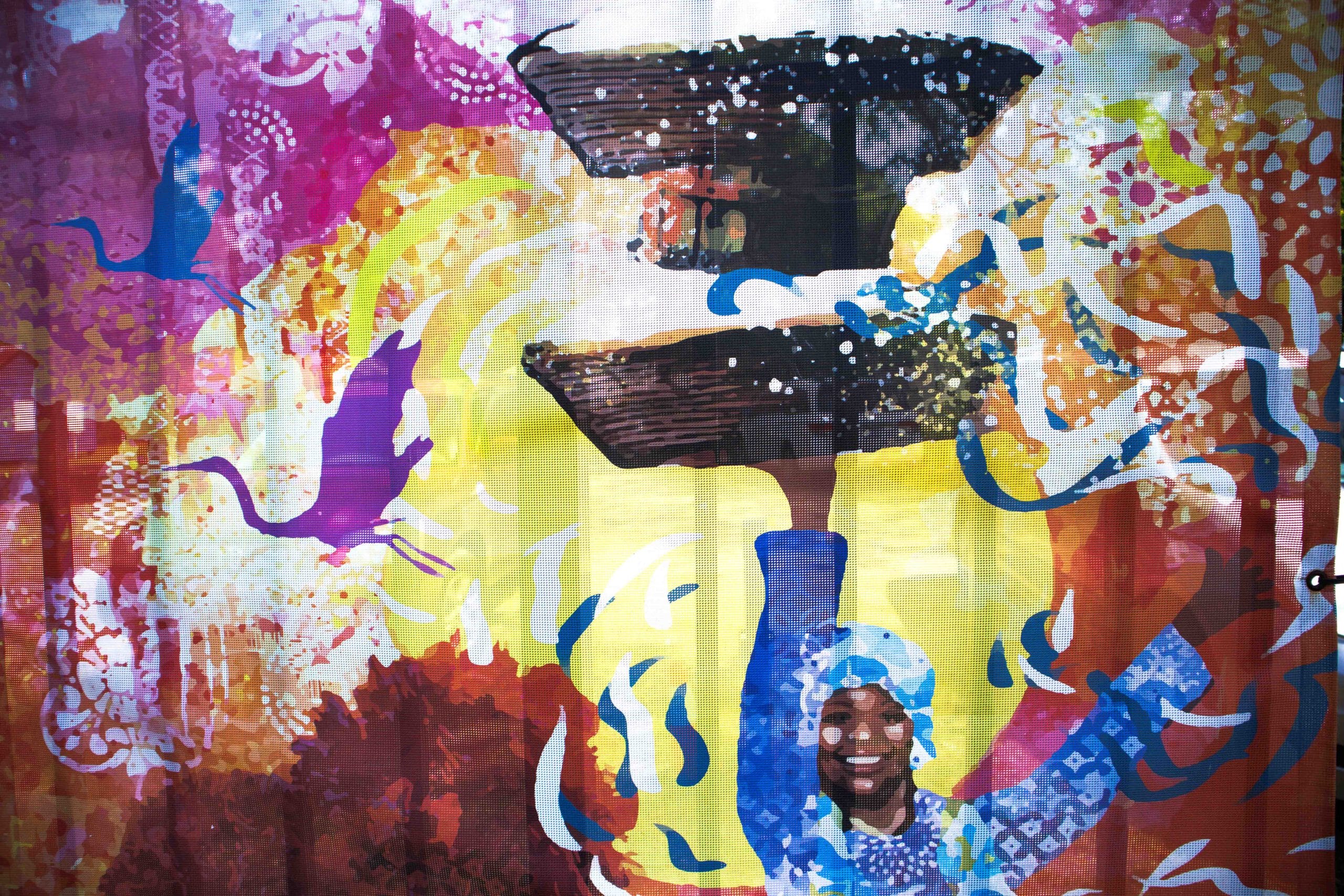 Gullah Geechee lady holding a sweetgrass basket smiling