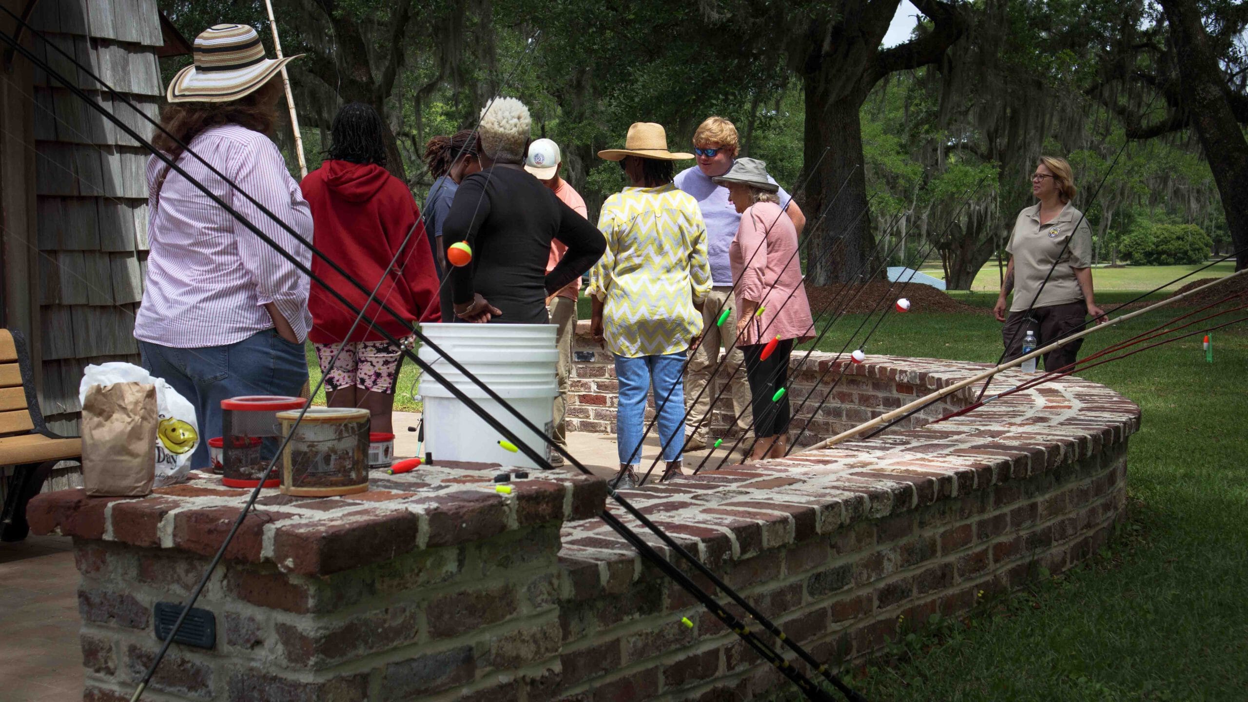 Group of people standing and getting ready to fish