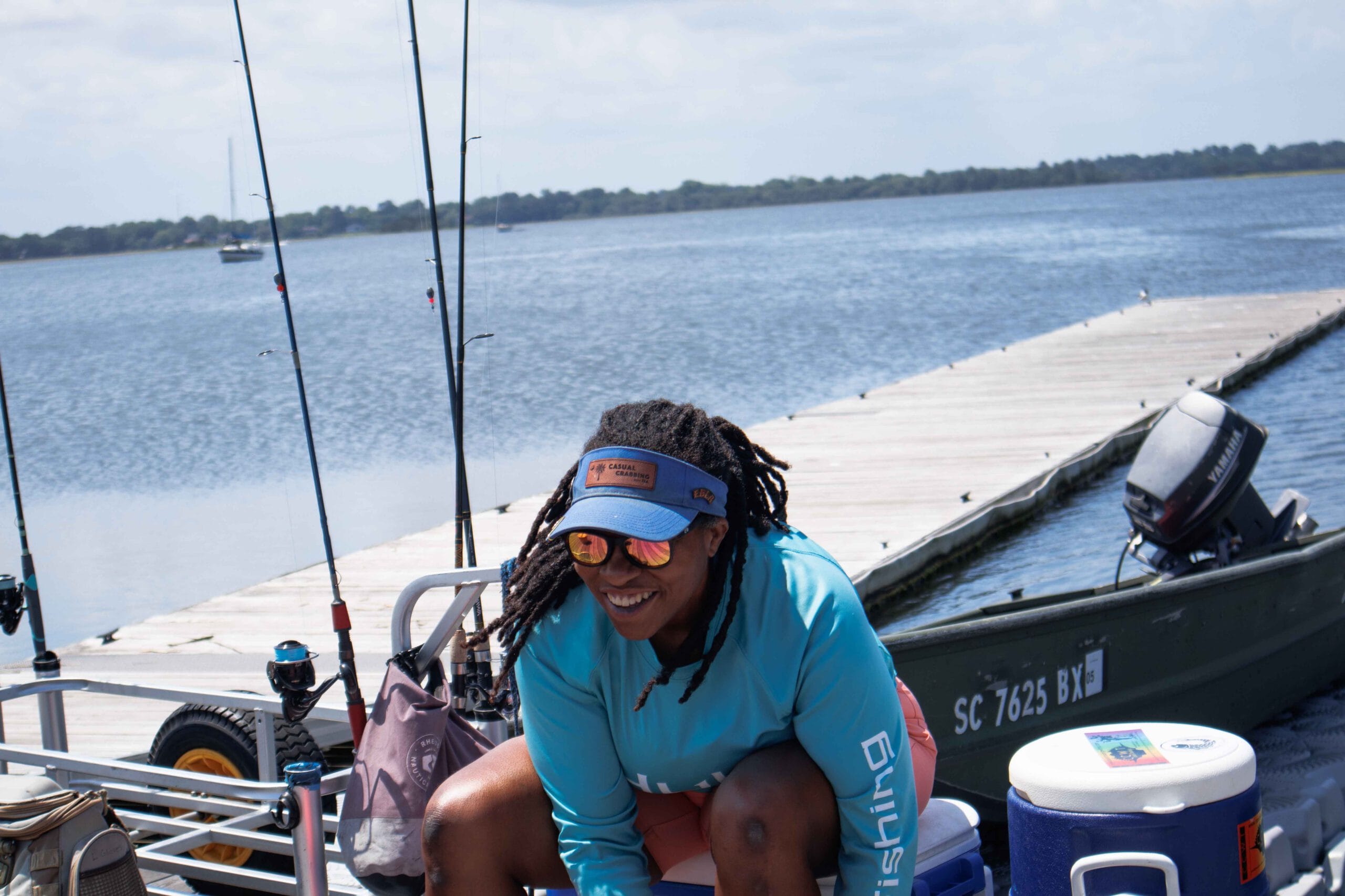 Picture of Tia on dock of Casual Crabbin with Tia